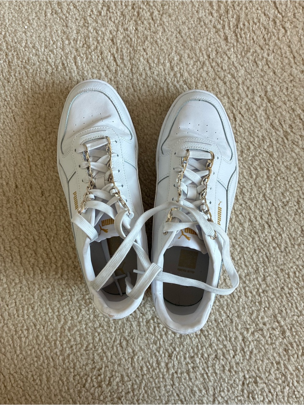 Puma White Sneakers with Gold Hardware
